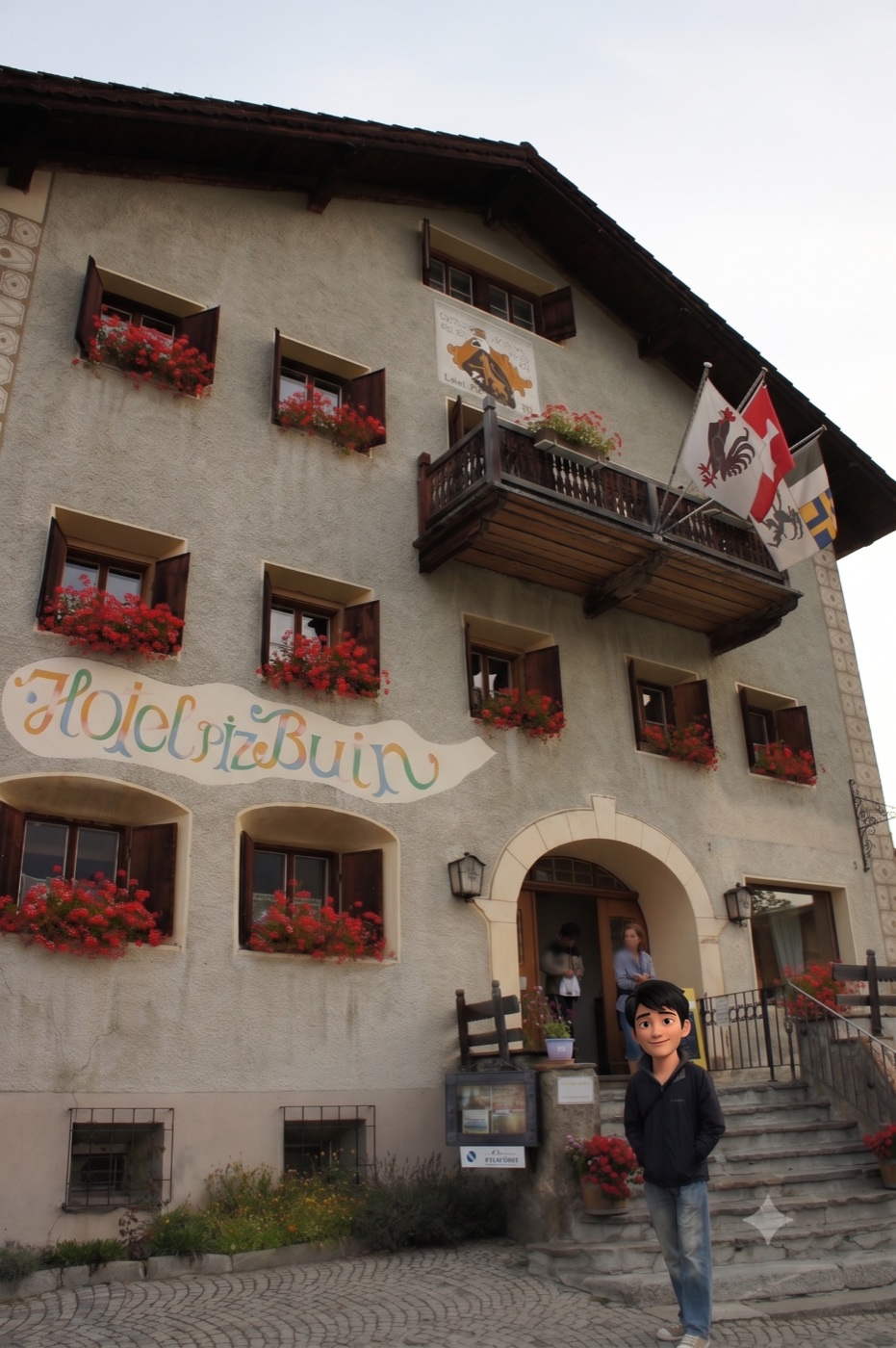 村で一番目立っていたのがこのHotel Piz Buin。窓という窓に赤いゼラニウムが飾られ、手描きのカラフルな看板もかわいい。バルコニーに